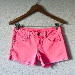 AMERICAN EAGLE Neon Pink Stretch Distressed Shorts